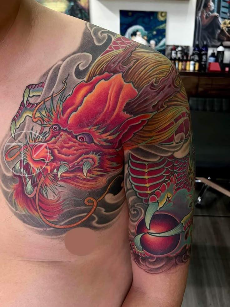 Top Hình Xăm Hợp Tuổi Tý Đẹp, Hút Tài Lộc & May Mắn Nhất 2026 | TKs Tattoo hinh xam rong bap tay qua nguc